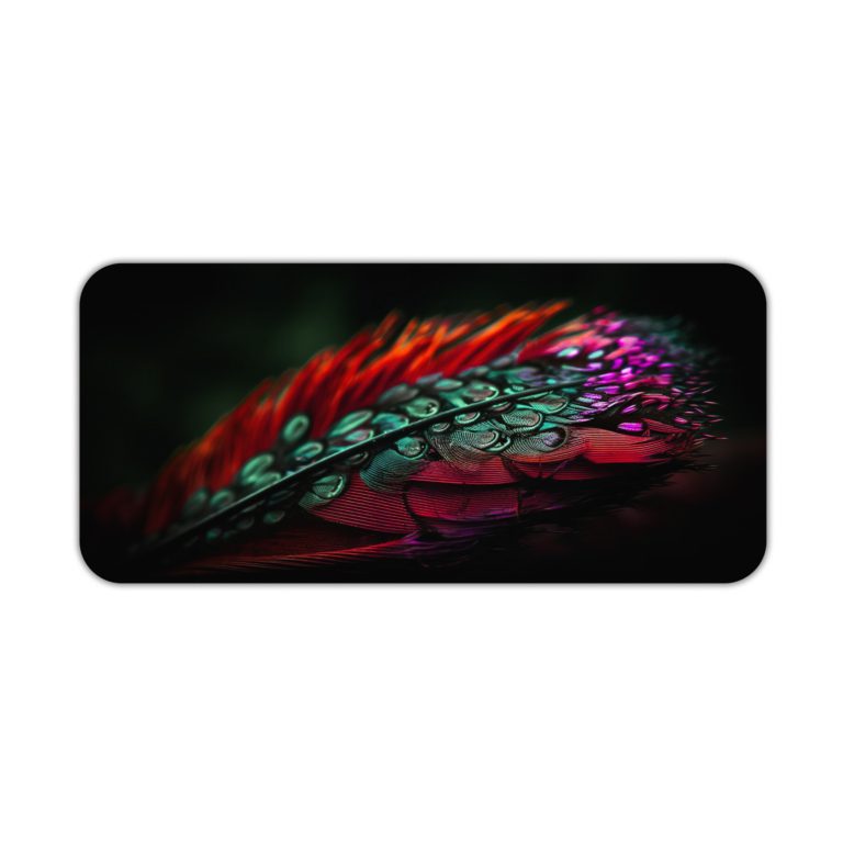 Colorful feather or leaf design with red, blue, green, and purple gradient pattern. Desk Pad kept on a plain white background