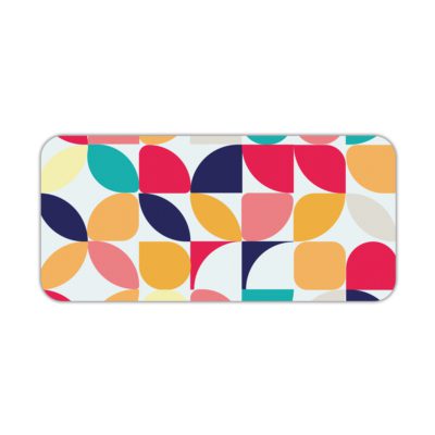 Infidu Artistic Desk Mat with a colorful geometric pattern of overlapping circles and quarter-circles in navy, pink, orange, teal, and yellow. Desk Pad kept on a plain white background