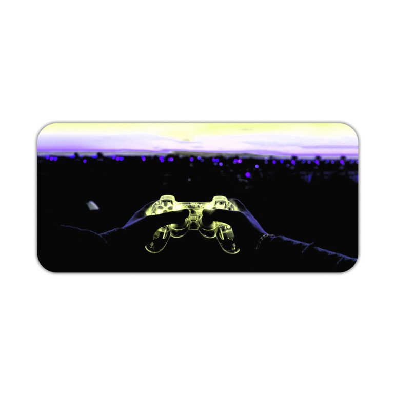 Gaming desk pad featuring a controller in black, navy blue, and yellow on a black background, designed by digital artists for a unique look Desk Pad kept on a plain white background