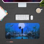 Anime-inspired Infidu Artistic Desk Pad with a blue, foggy scene, barren trees, stones, a full moon, and a mysterious figure on a reflective surface. Design Kept on a computer table