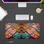 Infidu Vintage Books Design Desk Pad featuring vibrant, multi-colored book art Desk Pad kept on a plain gray background