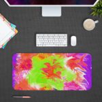 Infidu Artistic Desk Pad with a swirling, marbled design in pink, green, white, and orange. Design Kept on a computer table