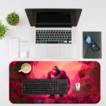 Desk pad featuring Kong on a vibrant pink background, designed by our digital artists. Desk Mat with an Apple Computer