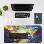 Desk pad featuring a colorful landscape with a winding road, distant tree, and vibrant sky. Desk Mat with an Apple Laptop