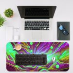 Gaming Desk Pad featuring a vibrant, randomly painted controller with a background in green, violet, and light yellow, designed for a unique and artistic look Desk Mat with an Apple Computer