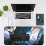 Two anime characters embrace under a glowing tree in a mystical, blue-toned landscape. Desk Mat with an Apple Laptop