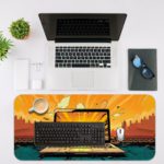 Infidu Tech Fusion with Laptop Desk Pad featuring a laptop against a dramatic background of orange and yellow clouds. Desk Mat with an Apple Computer