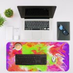 Infidu Artistic Desk Pad with a swirling, marbled design in pink, green, white, and orange. Desk Mat with an Apple Laptop