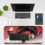 Desk pad with anime-style queen and dragon-like creature in red, gray, and black. Desk Mat with an Apple Laptop