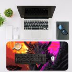 Desk pad featuring a close-up of a dragon's face and neck with intricate scales, set against a vibrant sunrise sky. Desk Mat with an Apple Laptop