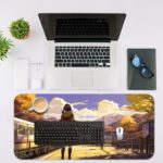 Infidu Artistic Desk Mat with an anime girl on a train platform, autumn trees, mountains, and a blue sky with clouds. Desk Mat with an Apple Laptop