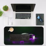 Desk pad featuring a sleek, futuristic sports car in glowing purple neon against a dark background. Desk Mat with an Apple Laptop