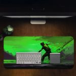 Desk pad featuring an anime character in a powerful pose with a sword, set against a vivid green background. Desk Pad in computer table