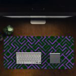 Dark desk pad with a geometric pattern of maze-like black and purple lines, adding a stylish touch to your workspace. Desk Pad in computer table