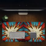 Infidu Color Wave Boom Animated Desk Mat with a vibrant blue and red background, featuring unique multi-colored art. Desk Pad in computer table