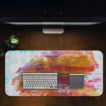 Infidu Artistic Desk Pad with pastel brushstroke patterns in light blue, white, pink, and orange. Desk Pad in computer table