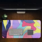 Infidu Artistic Desk Mat with colorful, irregular abstract shapes. Desk Pad in computer table