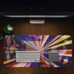 Infidu Artistic Desk Mat with colorful rays radiating from a central point, resembling a burst of light. Desk Pad in computer table