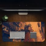 Desk pad with an anime girl walking through a warm-toned urban street at sunset, with detailed buildings and power lines. Desk Pad in computer table