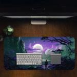 Infidu Space Desk Pad features a silhouette of a person looking at a surreal mountain view under a bright moon with floating celestial bodies. Desk Pad Design Kept on a computer table