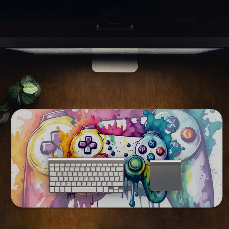 Gaming desk pad with a multi-colored controller on a white background, featuring vibrant paint splashes desk Pad with Antique Video Game Design Kept on a computer table