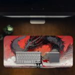 Desk pad with anime-style queen and dragon-like creature in red, gray, and black. Desk Pad on computer table