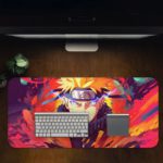 Naruto anime character with spiky blonde hair and headband against a colorful, explosive background in shades of purple, pink, orange, and blue. Desk Pad in computer table