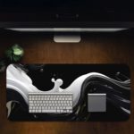 Infidu Artistic Pattern Desk Pad with a black background and white wave-like pattern Desk Pad in computer table