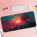 Desk pad featuring a fantastical landscape with a vibrant sky, silhouetted tree, and staircase leading into the distance. Desk Pad with Keyboard and Mouse