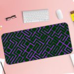 Dark desk pad with a geometric pattern of maze-like green and purple lines, adding a stylish touch to your workspace. Desk Pad with Keyboard and Mouse