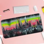 Abstract glitch art of a stylized cityscape with tall buildings silhouetted against a colorful, dreamy sky. Desk Pad with Keyboard and Mouse