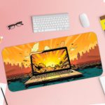 Infidu Tech Fusion with Laptop Desk Pad featuring a laptop against a dramatic background of orange and yellow clouds. Desk Pad with Keyboard and Mouse