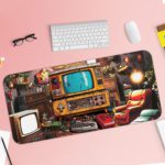 Infidu Tech Fusion Desk Pad with Cozy Vintage Room Design in Yellow Tones Featuring Old TVs, Computer, Orange Sofa, and Glowing Lamp Desk Pad with Keyboard and Mouse