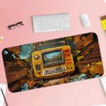 Infidu Tech Fusion With Joystick Desk Pad features a vibrant, colorful gaming controller and a natural background with trees, sea, and mountains Desk pad with keyboard and mouse pink background