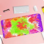 Infidu Artistic Desk Pad with a swirling, marbled design in pink, green, white, and orange. Desk Pad with Keyboard and Mouse