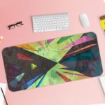 Infidu Artistic Desk Pad with angular abstract shapes in green, pink, purple, and yellow. Desk Pad with Keyboard and Mouse