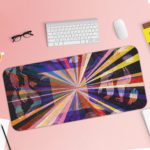 Infidu Artistic Desk Mat with colorful rays radiating from a central point, resembling a burst of light. Desk Pad with Keyboard and Mouse