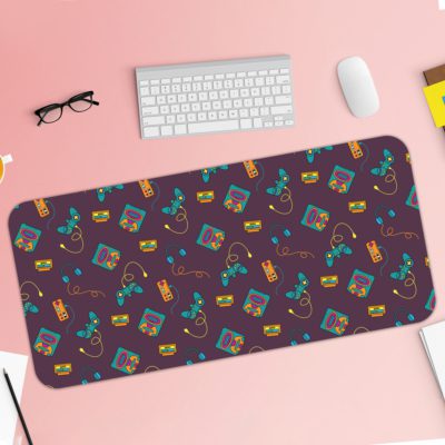 Infidu Creative Gaming Joystick Pattern Desk Pad featuring a dark maroon background with colorful illustrations of game controllers, headphones, and cassette tapes Desk Pad with Keyboard and Mouse