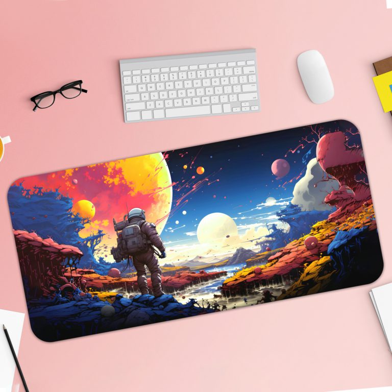 Infidu Space Desk Pad with an astronaut standing on an alien planet, featuring a colorful sky with multiple moons and vibrant colors. Desk Pad with Keyboard and Mouse