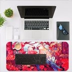 Two Birds printed on a desk mat