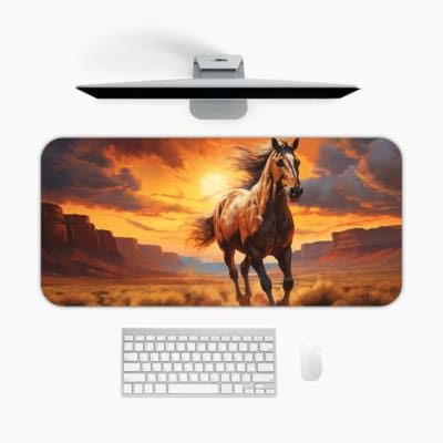 Running horse at sunset desk pad with a light brown horse in a desert landscape, dramatic sunset sky, and flowing mane. A desk pad under the computer