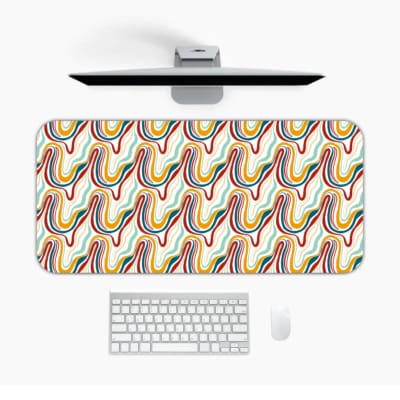 Infidu Geometric Pattern Art Desk Pad with wavy, colorful lines in bright shades for a dynamic and elegant workspace. Design Kept on a computer table