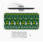 Infidu Knitted Pattern Desk Pad with a dark green background featuring white reindeer, Christmas trees, and snowflakes. Desk Mat with a Computer