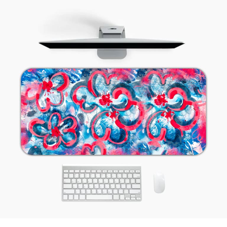 Infidu Desk Pad with vibrant pink and blue swirls, creating an energetic and eye-catching design. Desk Pad in computer table