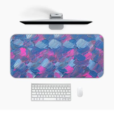 Infidu Desk Pad with blue and pink brush strokes blending, creating a dreamy and artistic effect on a light background. Desk Pad in computer table