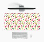 Infidu Vibrant Learning Zone Desk Mat with a cream background and small colorful food illustrations like pizza and hamburgers. Desk Mat with a Computer