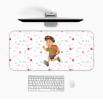 Infidu Running Boy Desk Mat with a white background, pink and green designs, and a cartoon boy running with a backpack, adding a playful touch. Desk Mat with a Computer