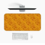 Infidu desk pad with a floral pattern on a yellow background, ideal for adding warmth and style to your workspace. Desk Mat with a Computer