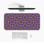 Infidu desk pad featuring a deep purple background with repeating yellow floral and star-like patterns. Desk Mat with a laptop