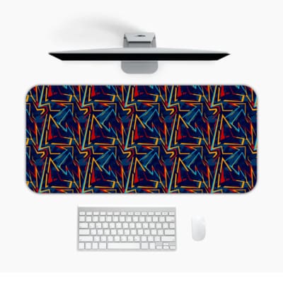 Infidu Vector Pattern Desk Pad with colorful geometric lines on a navy blue background, perfect for modern workspaces. Desk Mat with a laptop